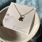 Jigsaw puzzle necklace